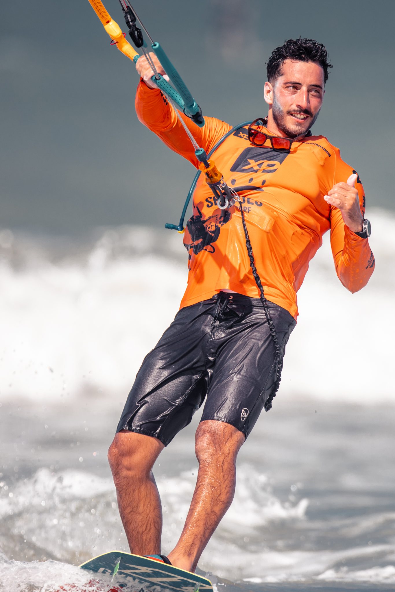 Man kitesurfing in Northeast Brazil during an exclusive downwind kitesurfing experience, showcasing the best routes and conditions for kitesurfers.